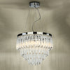 Fame 5 Light Pendant Glass and Polished Nickel with a nise light reflection