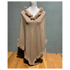 Taupe faux fur poncho with luxurious texture for women.
