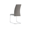 Stylish upholstered dining chair with a sleek cantilever frame.
