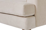 Fletcher Snuggle Chair in Cream shown from the side (8)