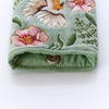 Velvet glasses case with floral embroidery and bead details

