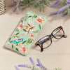 Soft velvet glasses case with feathered floral accents

