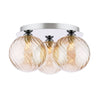 Foley 3 Light Flush Polished Chrome With Twisted Amber Glass picture of the turned on light