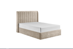 Elegant 4ft6 bed with upholstered beige fabric.