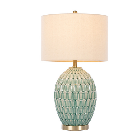 Illuminate your space with the Gemma Ceramic Table Lamp.