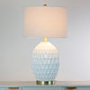 Stylish table lamp with a broad cream shade for soft lighting
