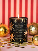 Glittering Gold Medium Scented Candle styled in a festive room setting
