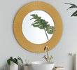 "Chic Gold Round Mirror Adding Glamour to Any Space"
