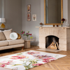 Laura Ashley Gosford Floral Rug Cranberry lifestyle picture in the living room