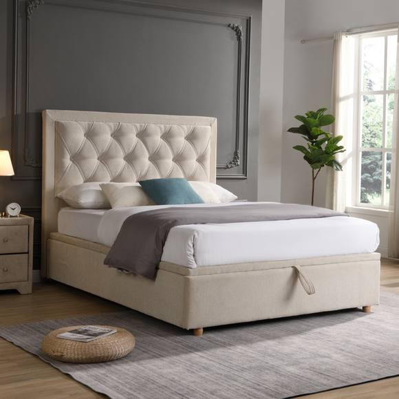 Luxurious king-sized bed with upholstered headboard.