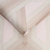 Stylish pink geometric wallpaper with rose gold accents by Graham & Brown
