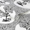 Black and white tree wallpaper by Graham & Brown for home decor

