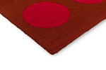 Brink & Campman Habitat Festival Dots Outdoor Rug Red hand-tufted rug with a low pile