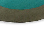 Brink & Campman Habitat Festival Outdoor Rug Aqua Round made in a teal and olive green color shades