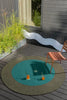 Brink & Campman Habitat Festival Outdoor Rug Aqua Round lifestyle picture outside