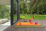 Brink & Campman Habitat Festival Stripe Outdoor Rug Orange lifestyle picture outside