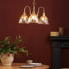 Hadano 3 Light Pendant Natural Brass and Glass life style picture