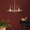 Hadano 3 Light Pendant Natural Brass and Glass Floral Shades life style picture