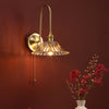 Hadano Wall Light Natural Brass and Flared Glass life style picture