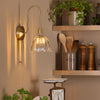 Hadano Wall Light Natural Brass and Scalloped Bell Glass life style pictuer