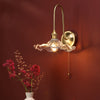 Hadano Wall Light Natural Brass and Wavy Glass life style picture