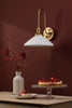 Hadano Wall Light Natural Brass and White Shallow Ceramic Shade perfect for contemporary interiors