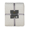 Scatterbox Halo Throw Cream bed throw with a geometric pattern