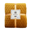 Scatterbox Halo Throw Antique Gold with a soft geometric stitching pattern