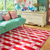 Harlequin Basketweave Geometric Rug Coral Rose lifestyle picture in the living room