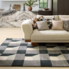 Harlequin Blocks Geometric Rug Slate ifestyle picture in the living room