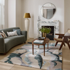 Harlequin Calathea Floral Rug Shiitake/Wildwater lifestyle picture in the living room