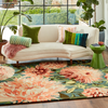 Harlequin Dahlia Floral Rug Coral/Wilderness lifestyle picture in the living room
