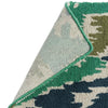 Harlequin Ixora Outdoor Rug Emerald Palm Chartreuse with a poly