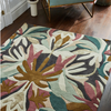 Harlequin Melora Abstract Rug Positano/Succulent/Gold lifestyle picture in the living room