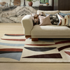 Harlequin Torillo Geometric Rug Cornflower/Walnut. lifestyle picture in the living room