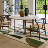 Harlequin Torillo Geometric Rug Emerald/Azul lifestyle picture in the dining room