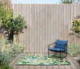 Harlequin Tree Tops Outdoor Rug Green
 lifestyle picture outside