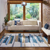 Harlequin Zeal Bohemian Rug Indigo lifestyle picture in the living room