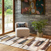 Harlequin Zeal Bohemian Rug Taupe
 lifestyle picture in the living room