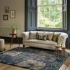 Morris & Co Morris & Co Honeysuckle & Tulip Floral Rug Woad/Thyme lifestyle picture in the living room