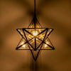 Ilario Small Star Pendant Antique Brass Glass life style picture with switched on light