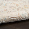 Nourison Isla Rug ISL01 Ivory Floral Rug is a machine-made rug with a low-high cut pile