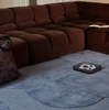 Marimekko Iso Unikko Floral Rug Dusty Blue lifestyle picture in the living room