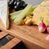 Elegant James Martin cheeseboard with knives and utensils
