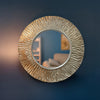 Kelsey Mirror Round Champagne 100 cm life style [picture on the navy blue wall