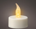 LED Tealight Plastic Fire Flame Effect picture on the dark background