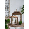 Lantern Set of 2 Gold 57cm picture of the lanterns on the side table