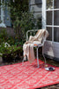 Laura Ashley Porchester Outdoor Floral Rug Poppy Red lifestyle picture outside