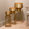 Lia Set of 3 Planters With Stand Brass Black life style picture also able in a gold color shade