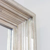 Minimalist champagne mirror ideal for hallway styling